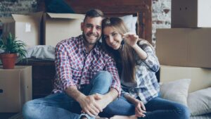 First-time homebuyer couple receiving keys with down payment assistance in Arizona