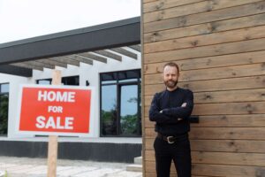 Real estate investor standing in front of an Arizona rental property purchased with a DSCR loan